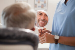 Benefits of Dental Implants Over Traditional Dentures
